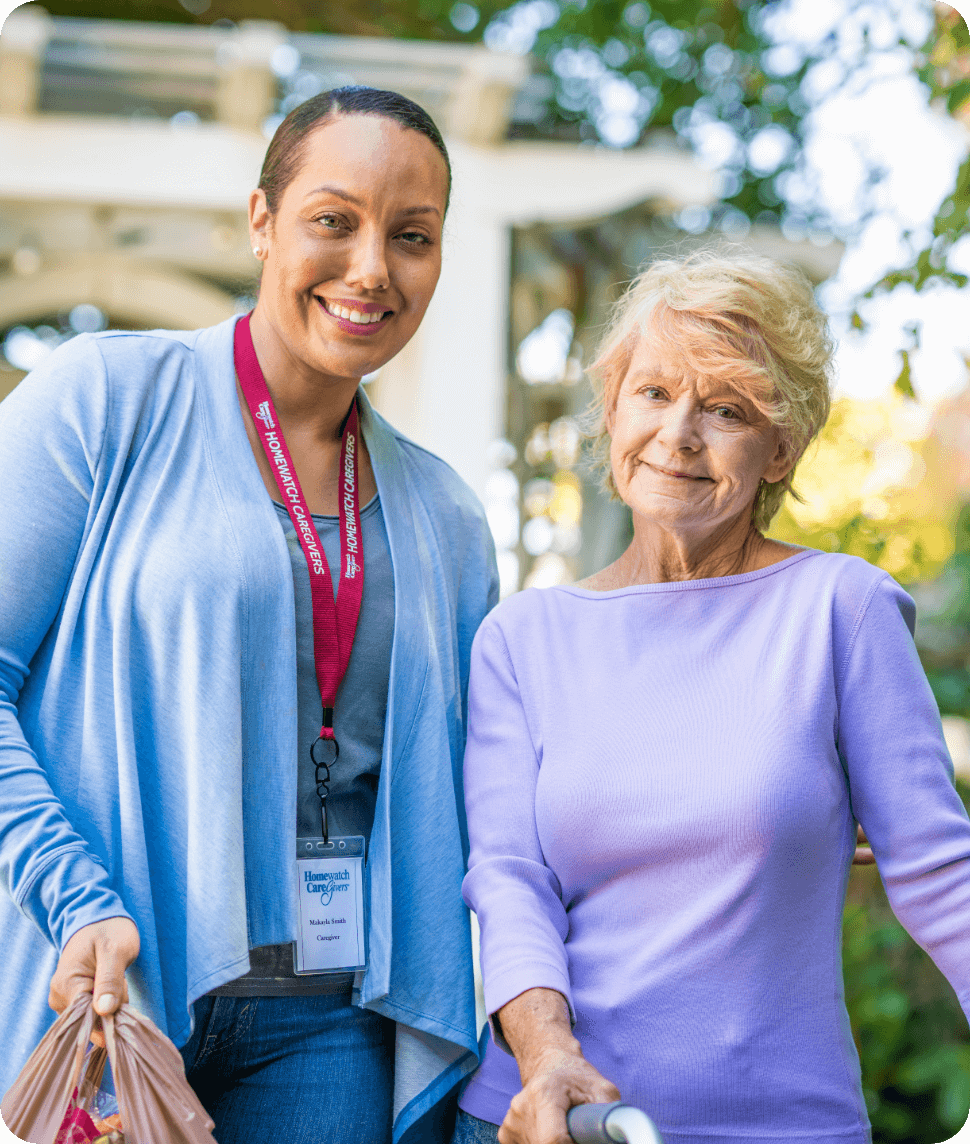 A Homewatch CareGivers teammember with an elderly client