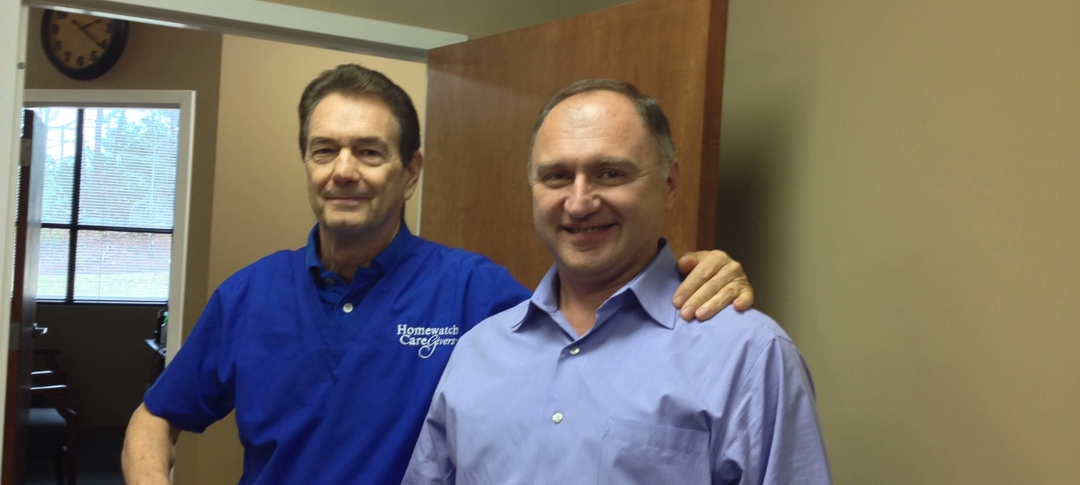 Andy Preston and Homewatch CareGivers franchise owner Anzor Gachechiladze.