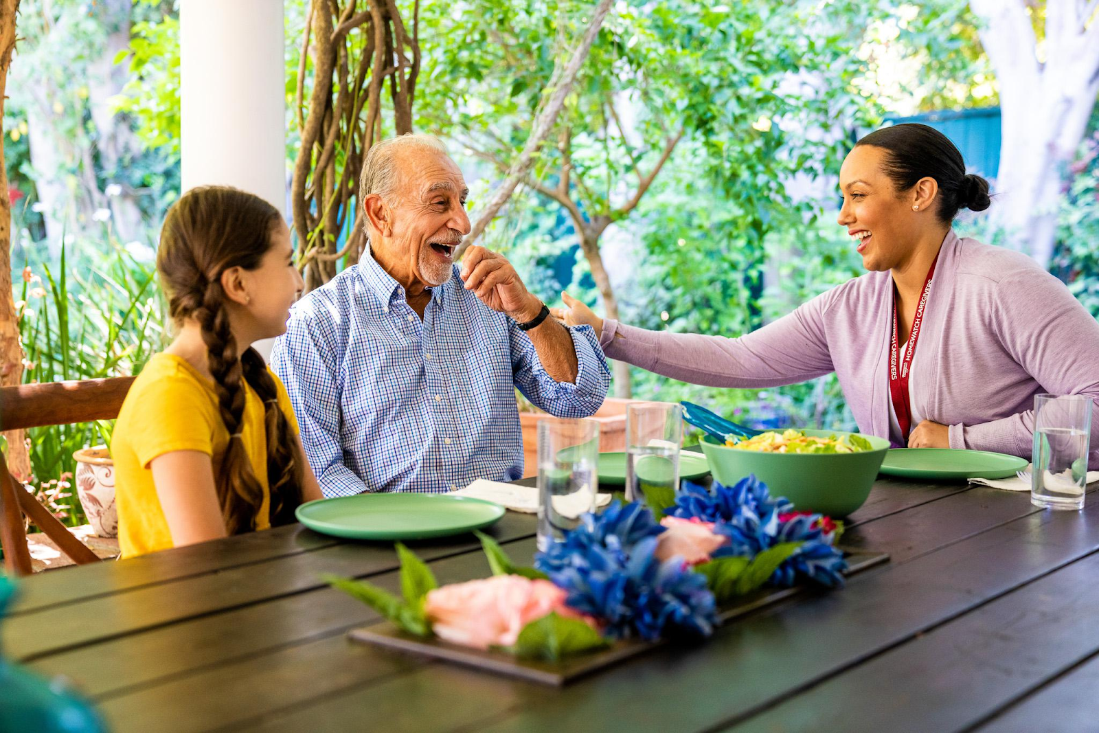 An aide smiling with client