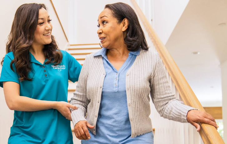 An aide with client