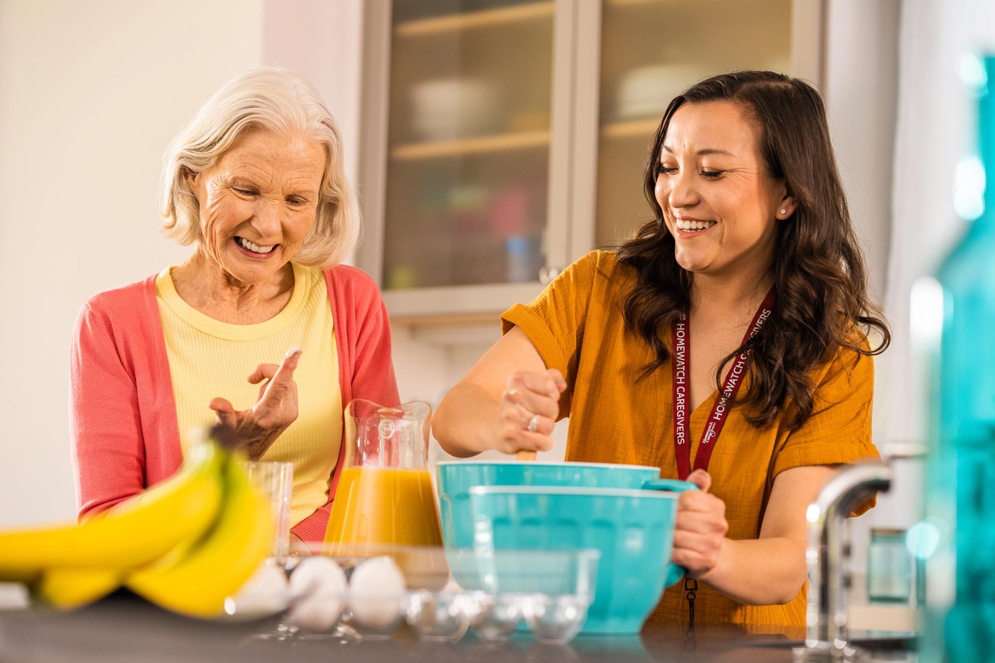 A patient and caregiver preparing food