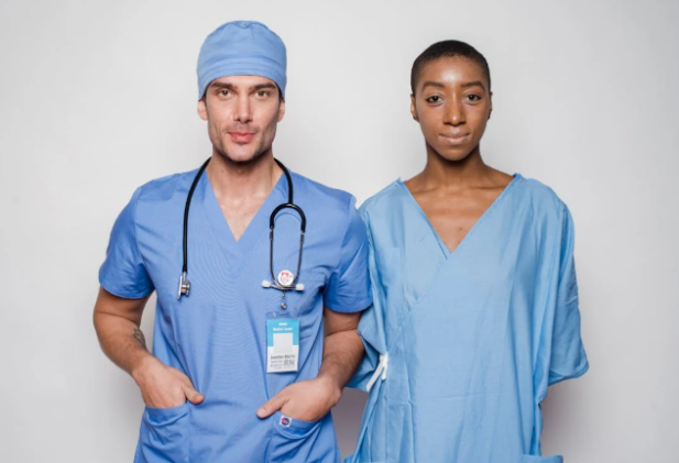 doctor and patient standing next to each other