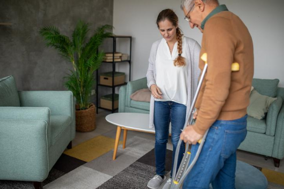 man walking with crutches