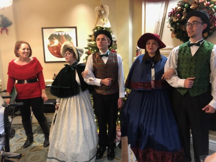 Christmas Carolers spreading holiday cheer