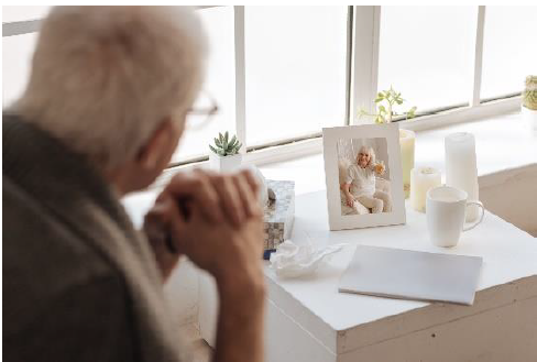 man looking at a photo