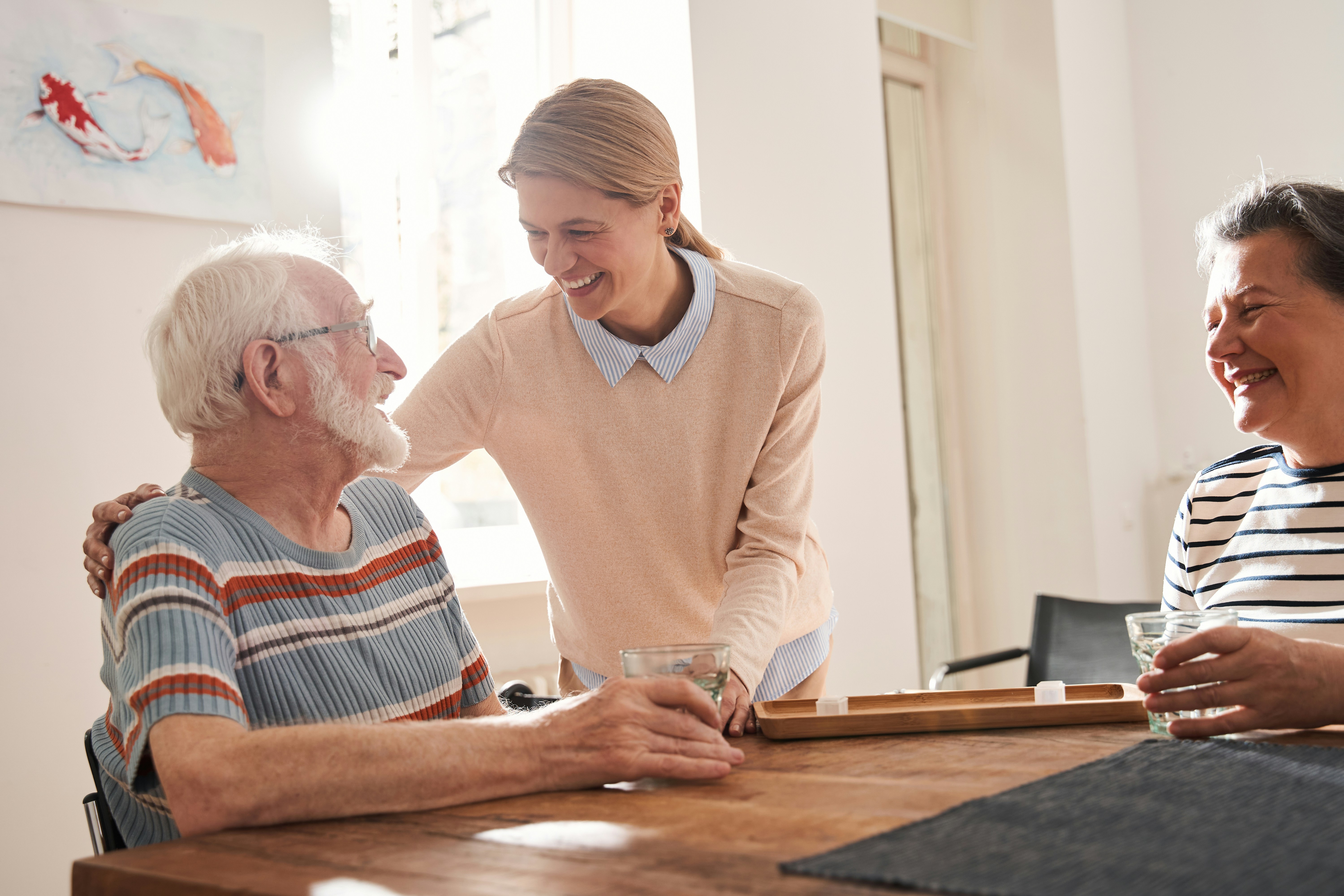 caregiver with older couple