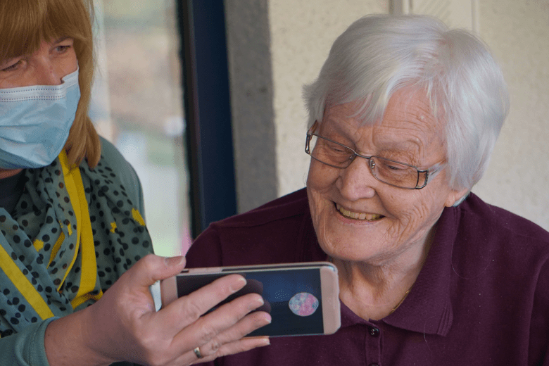 caregiver helping her client