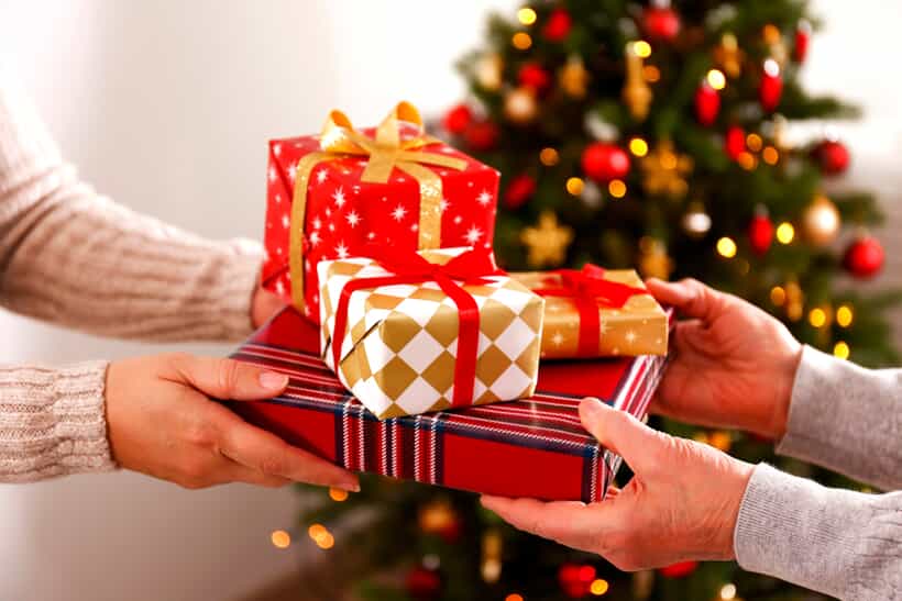Gifts being given from one person to another