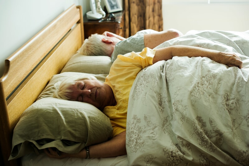 Elderly couple sleeping